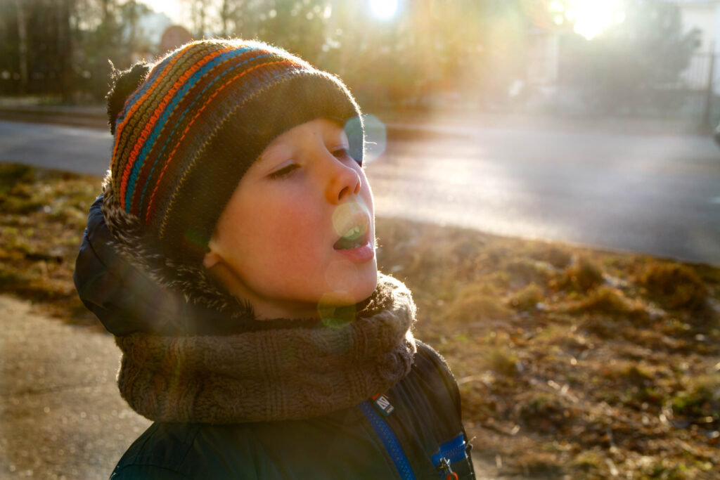 Why can I see my breath on a cold day?